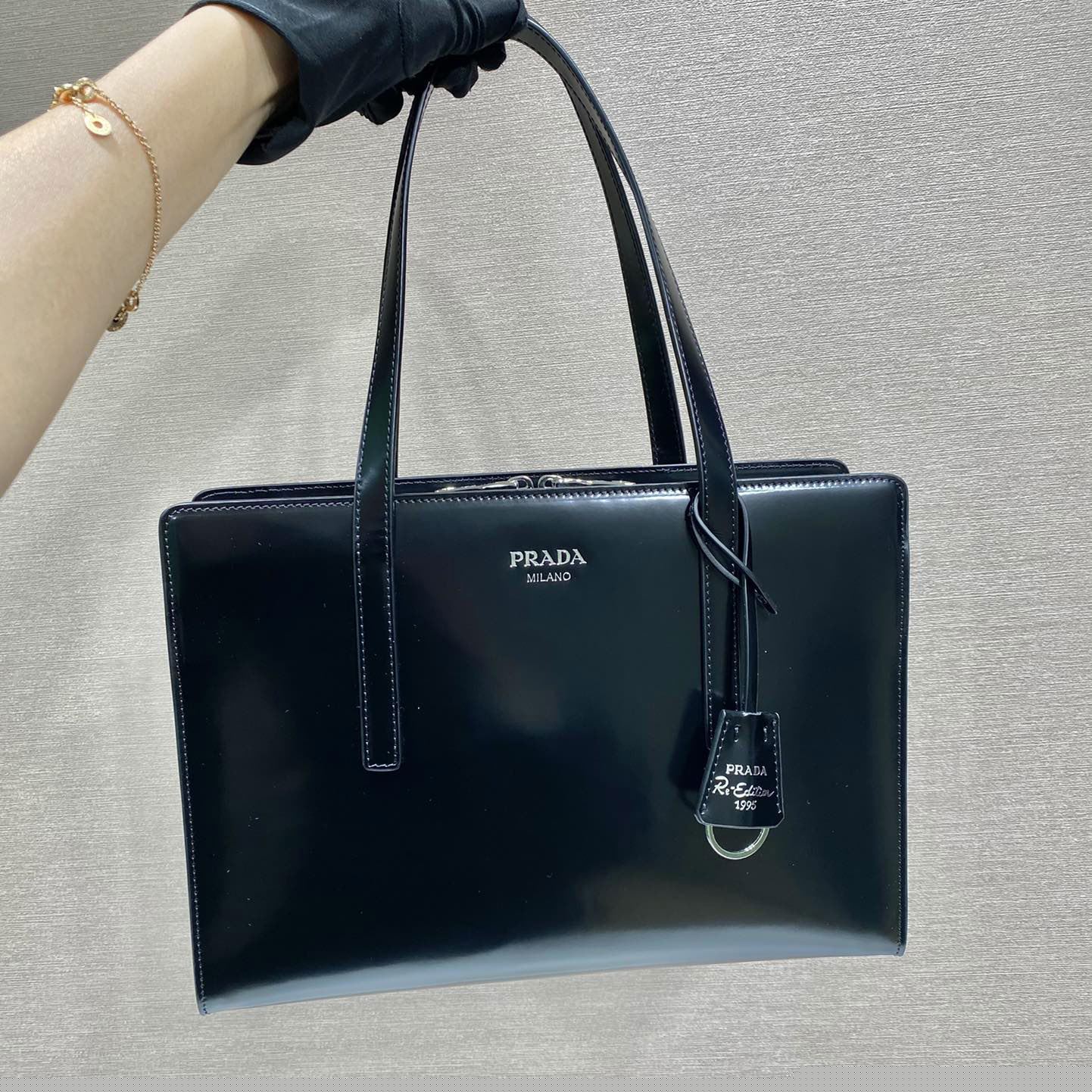 Pra*a top handle bags